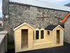 Twin Beach Huts And Sandpit Stage