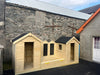 Twin Beach Huts And Sandpit Stage